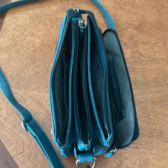 Osgoode Marley Teal Leather Crossbody Travel Bag - Picture 5 of 8